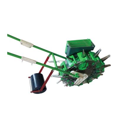 China Portable Farm Machinery Wheels for Corn Planter Peanut Bean Onion Hand Push Soybean Seeder Machine for sale