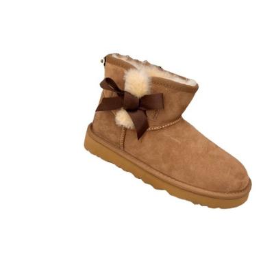 China 2021 Fashion Trend Wholesale Winter Women's Snow Boots Uggly Short Down Luxury Boots For Ladies for sale