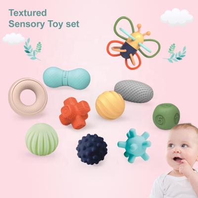 China Toy Amazon Hot Selling Colorful Silicone Musical Soft Toy Ball Baby Rattle Set Baby Toys Silicone Rattle for sale