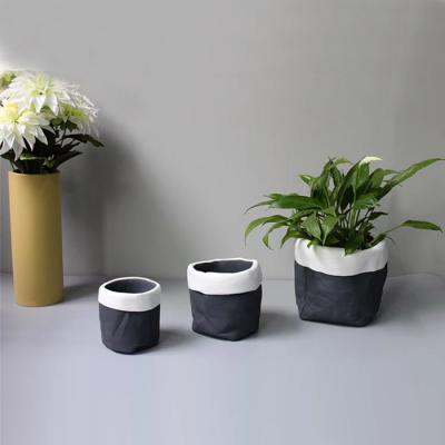 China Modern Concrete Black Cheap Indoor Plant Flower Pot Planters for sale