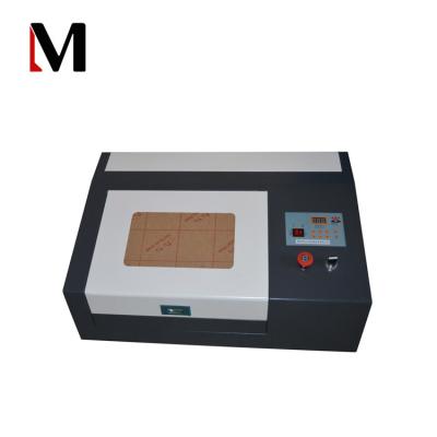 China Laser Engraving Wood Pen Laser Engraving Machine Metal Laser Engraving Machine Jewelry Laser Engraving Machine for sale