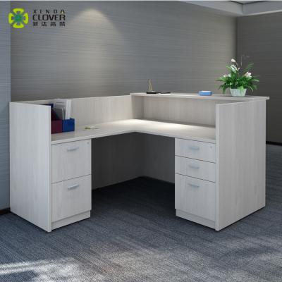 China Modern Design Small Office Furniture Wooden L Shaped Reception Desk For Office for sale