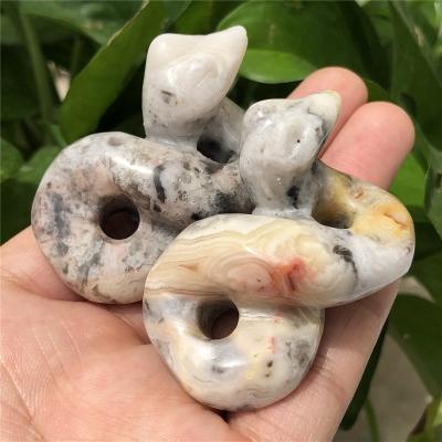 China Wholesale Natural Skulls Figurine Europe Crystal Crazy Agate Snake Hand Carved Healing Crystal Statue for sale