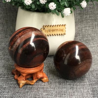 China Wholesale natural red hand polished quartz spheres from Europe tiger eye crystal ball gifts collection fengshui for sale