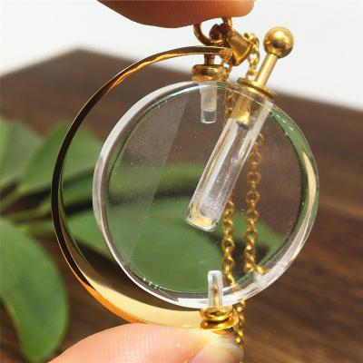 China Europe 2021 Hot Selling Irregular Mini Essential Oil Perfume Bottle Pendant Gemstone Necklaces Mysterious Crystal Diffuser Necklace for sale