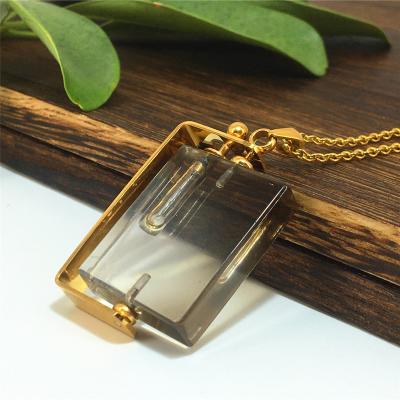 China Europe 2021 Hot Selling Irregular Mini Essential Oil Perfume Bottle Pendant Gemstone Necklaces Mysterious Crystal Diffuser Necklace for sale