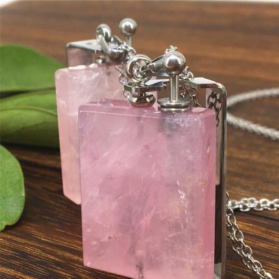 China Europe 2021 Hot Selling Irregular Mini Essential Oil Perfume Bottle Pendant Gemstone Necklaces Mysterious Crystal Diffuser Necklace for sale