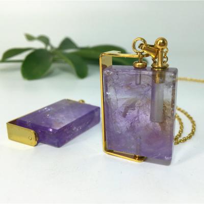 China Newly Hot Selling Europe High End Openable Crystal Rose Quartz Necklace Perfume Bottles Oil Essential Pendant for sale