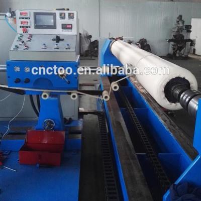 China Automatic Rubber Roller Machine WBJ6040 Rubber Roller Covering Machine for sale