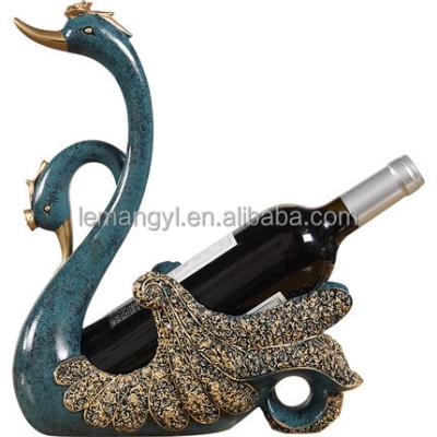 China OEM ODM Customization Table Decoration Viable High Quality Table Ornament Glazed Swan Wine Rack Craft Decoration for sale