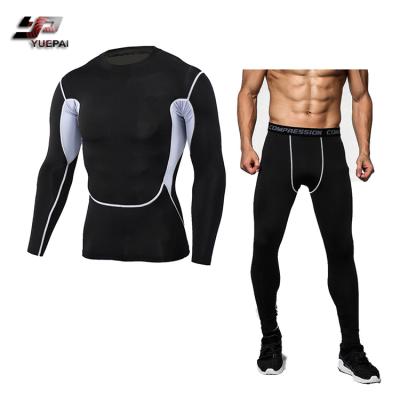 China Breathable Wholesale Custom Compression Fitness Gym Sportswear Common Wear Men Tight for sale