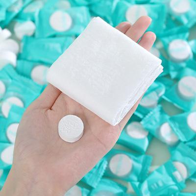 China 2021 tablets 100% rayon cheap disposable custom magic egg hand compressed face towels for sale