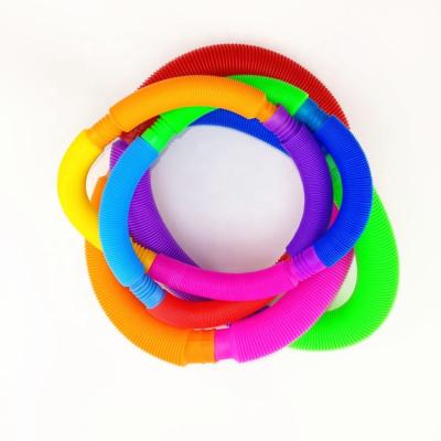 China Mini Type Plastic Colorful Stress Relief Push Up Sticky Person Stretch Tube Hose DIY Sensory Funny Toys for sale