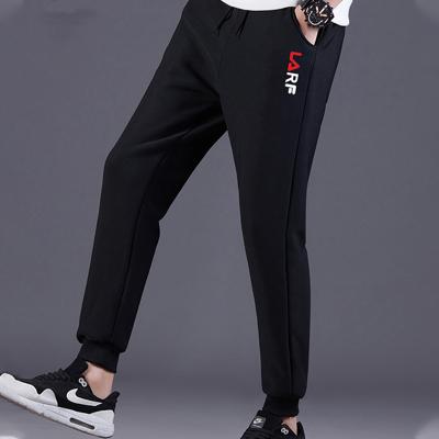 China Spring and Autumn Slim QUICK DRY Pants For Men Cotton Empty Black Sweatpants for sale