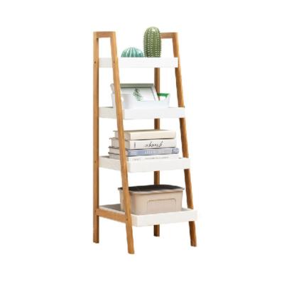 China Simple living room multi-layer wall-mounted simple pure bamboo children's floor storage compartment storage trapeze shelf for sale