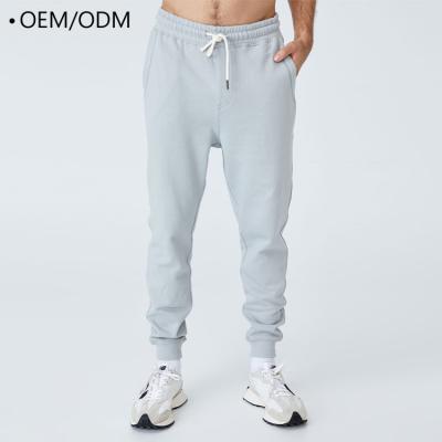 China Anti-Wrinkle Wholesale Customized Logo Cotton Suction Rope Waistband Elastic Men's Casual Sports Tracksuit 100% With Pocket for sale