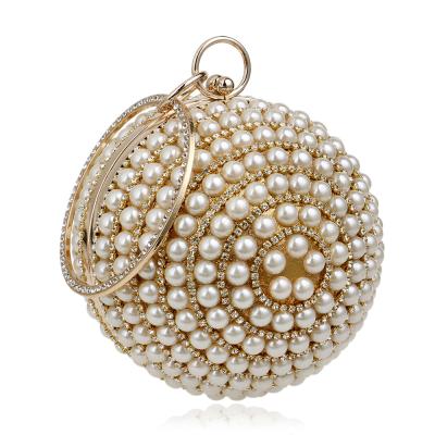 China Shiny Evening Clutch Purse Women's Round Ball Purse Full Rhinestone Ring Handle Purse Pearl Evening Clutch Bag for sale