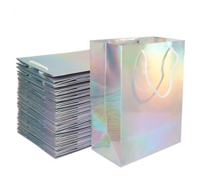 China Recycled Materials Ready To Ship Custom Logo Shiny Color Gift Holographic Paper Bag With Handles Holographic Paper Bag for sale