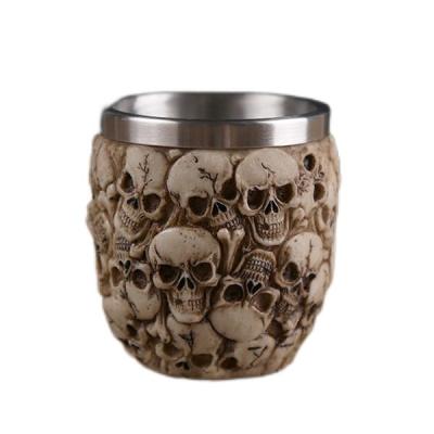 China Factory direct supply creative resin stainless steel skull mug can be used for drinking whiskey, red wine, beer cups. for sale