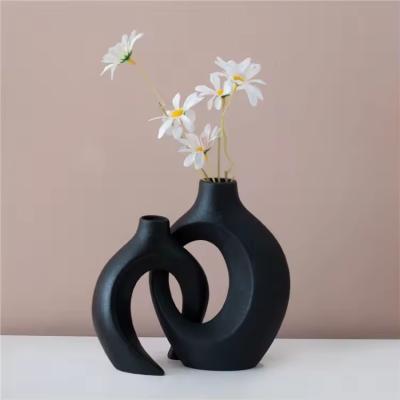 China Nordic-style Ceramic Ornaments Creative Burning Crafts Home Hydroponic Dry Flower Vases Wholesale Black Ceramic Vase Set for sale