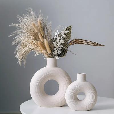 China Creative Nordic Ceramic Flower Arrangement Creative Burning Flower Vase Frosted Metal Spot Hydroponic Home Decoration for sale