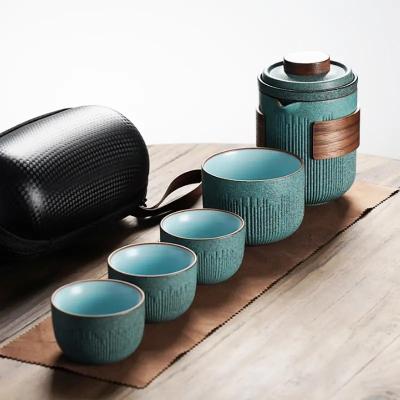 China New Pottery Kung Fu Tea Cup Set Set A Pot Of One Master Tea Cup Three Small Cups Portable Teapot Ceramic Travel Tea Set for sale