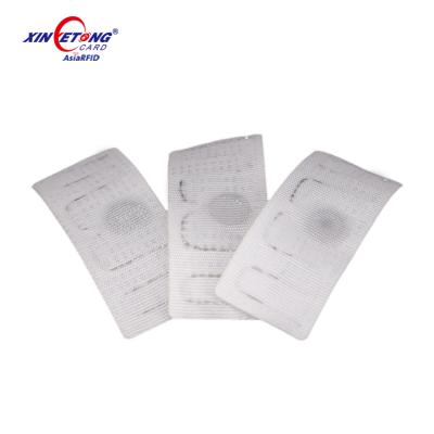 China Waterproof / Waterproof Uhf Fabric Laundry Detachable Rfid Tags Silicone Available for sale