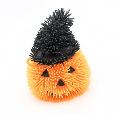 China Eco-Friendly Huayi TPR Soft Pumpkin Led Stripper Ball Spike Flashing Toy For Halloween for sale