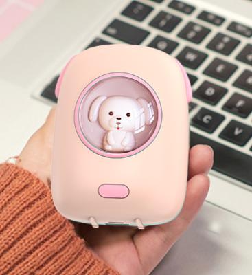 China Cute New Year Gift 10000mah Type C Input 2 In 1 Hand Power Bank Hotter for sale