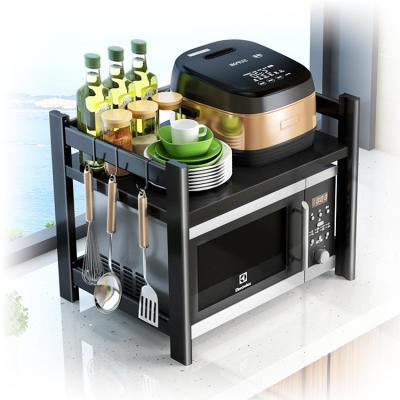 China 2 Layer Multifunctional Retractable Folding Kitchen Shelves Oven Microwave Rack for sale