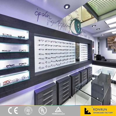 China Shopping Mall Baking Paint Counter Optical Shop Furniture Design With Led Light for sale