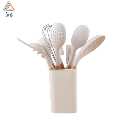 China New Viable Hot Selling Silicon Utensils 11pcs Amazon Kitchenware with Wooden Handle for sale