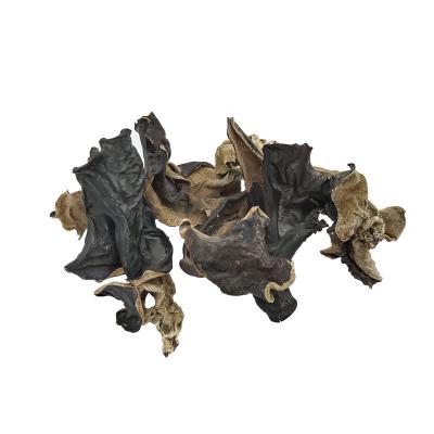 China Tree dry edible dry black fungus full cut black fugus fungus dried black fungus piece agaric wood sliced ​​black fungus block for sale