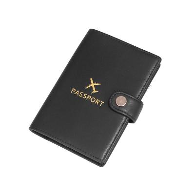 China Custom Fashion Real Gold Stamping Airplane Black Leather Anti-theft Passport Holders With Button Closure for sale