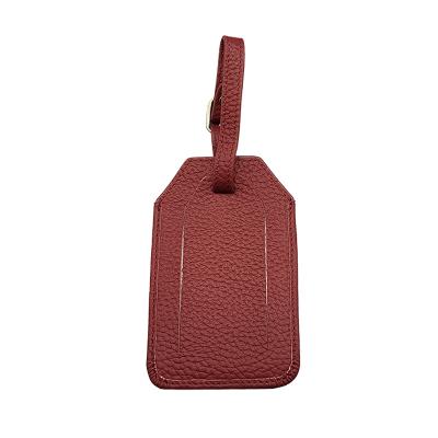 China High Quality Grain Pebble Check-in Disc White Bentgrass Leather Luggage Tag For Hotel Gift for sale