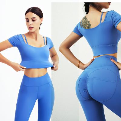 China Breathable Women High Waisted Sports Gym Wear Tights Custom Compression Yoga Gaiters Crop Top 2 Pieces Seamless Wholesale Yoga Set for sale