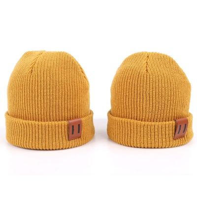 China Lederflicken Knit Beanie-Hüte fertigen warme Hut-Kappen-Gelb Beanie-Hüte kundenspezifisch an zu verkaufen