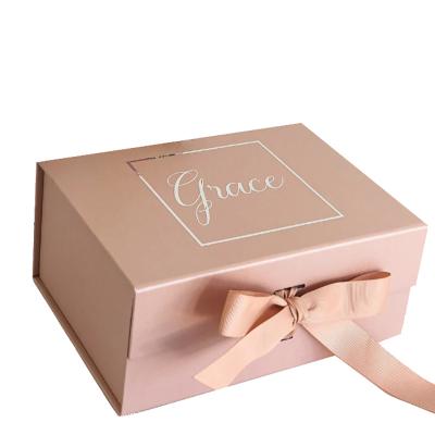 China Recyclable New Arrival High-end Customized Pink Color Magnetic Book Shape Cardboard Gift Foldable Box For Gift Packaging With Logo for sale