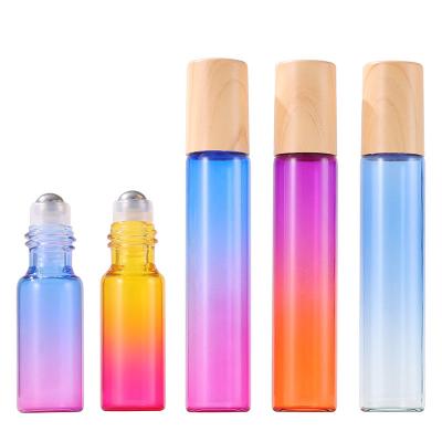 China 10ml Cosmetic Glass Roll On Bottles Large Stainless Ball Gradient Color Roll On Bottle For Essential Oils , Perfume for sale