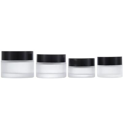 China Cosmetic face cream jars 5-100g empty refillable cosmetic jar 1oz frosted glass jar for cream, ointment, loose powder, eye shadow for sale