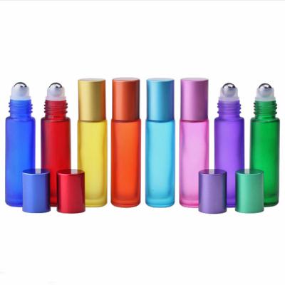 China Cosmetic Frosted Glass Colored Perfumes Sample Vials 10ml Roll Ball Bottle Massage Roll On Bottle For Essential Oils for sale