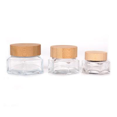 China Oblique Shoulder Bottle 30g 50g Hexagonal Lotion 100g Glass Jar Oblique Shoulder Clear Cosmetic Glass Cosmetic Jar Cream Jar With Bamboo Lid for sale