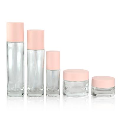 China Pink Cosmetics Cosmetic Jar And Bottles Set Skin Care Face Cream Bottle 30ml Glass Empty Lotion Bottle 100ml With Pump for sale