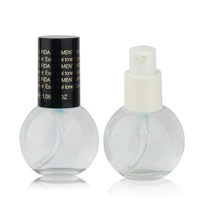 China Clear 1oz Round Lotion Pump Bottle Base Empty Cosmetic Glass Essence Bottle Refillable Pump Bottle With Black Lids for sale