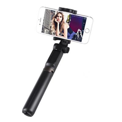 China Universal 360 Rotation Hot Selling Selfie Stick With Cell Phone Clip Smartphone Mini Tripod Lightweight Extended Tripod for sale