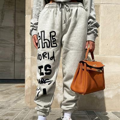 China Fashion anti-pilling clothes 2021 new arrivals women trotter sports tracksuit women loose drawstring pants stretching letter print joggers pants women for sale