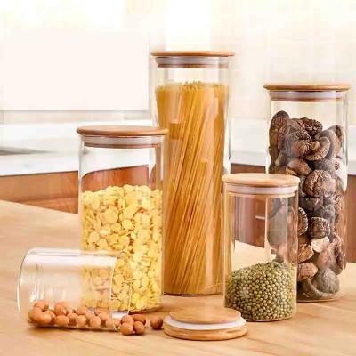 China Classic Wholesale 250ml 500ml Empty Spice Candy Coffee Food Storage Containers Bottle Bamboo Seal Lid Glass Jars for sale