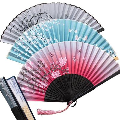 China 2022 Factory Price Customized Asian Large Size Bamboo Cloth Foldable Hand Fan Party Supplies for sale