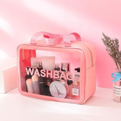 China 2020 New Stylish Triangle Geometric Bag Design Stitching Rubik's Cube Geometry Rhombus Laser Diamond Makeup Bag Cosmetic for sale