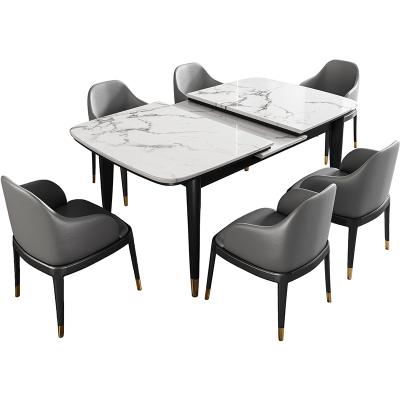 China New Design High Quality Luxury Modern Extendable Dining Room Furniture Rotating Top Dining Chairs Set 6 for sale